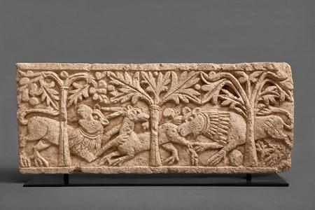Lions and antelope, 6th or 7th century CE. Limestone relief fragment; architectural element, 12 × 29 1/4 × 2 1/8 inches. Possibly from El Minya. The Nadler Collection.
